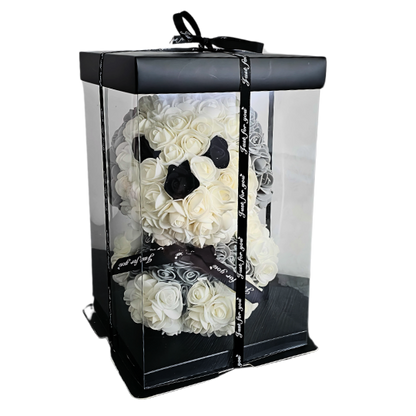My Loyal Forever rose puppy with handcrafted floral details, beautifully packaged in a clear box with ribbon, ready for gifting to celebrate birthdays, pet enthusiasts, or heartfelt moments. My Loyal Forever rose puppy featuring intricate white, grey, and black roses, part of the Snug & Hug collection, ideal as a unique, heartfelt keepsake gift for pet lovers and special occasions. My Loyal Forever - Snug Box