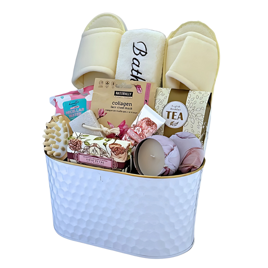 luxury spa gift basket, bath gift set, lavender candle, facial mask, hand cream, pumice stone, wooden massage tool, bath slippers, English breakfast tea, self-care gift. The Pamper Retreat Box - Snug Box