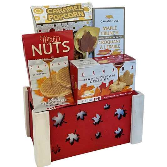 Canadian gift basket with maple cookies, maple chocolates, maple syrup snacks, caramel popcorn, stroopwafels, Canada souvenir food gift, maple gift set. True North Treats Box - Snug Box